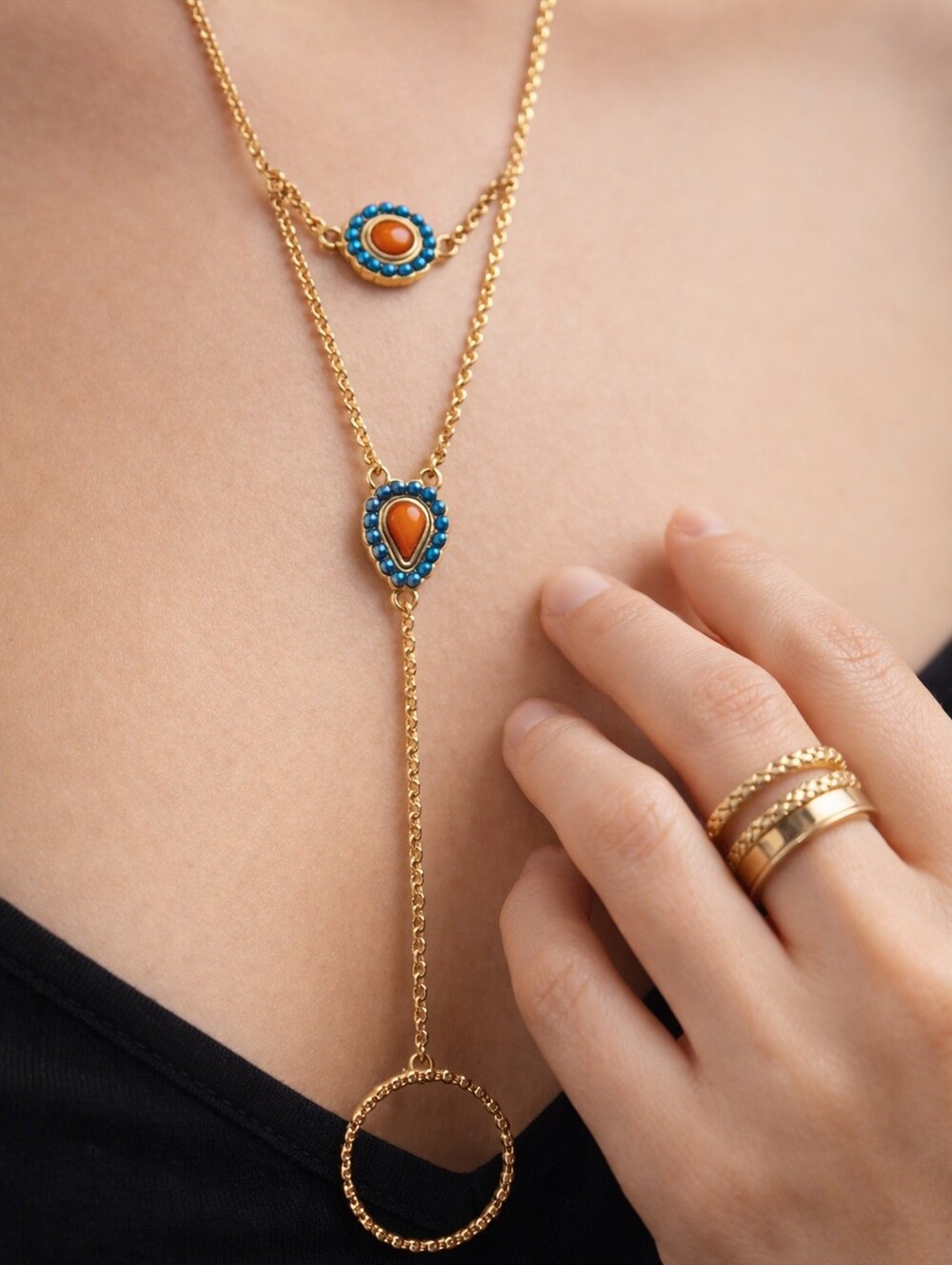 Women's Stylish Gold tone Hand Chain with 5 rings & Blue-Orange Stones